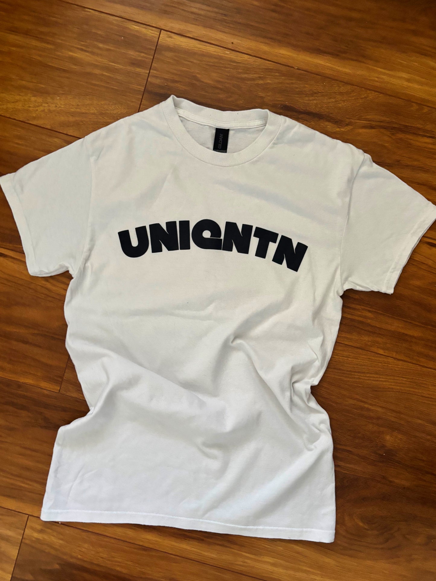 “The First Mark” white tee