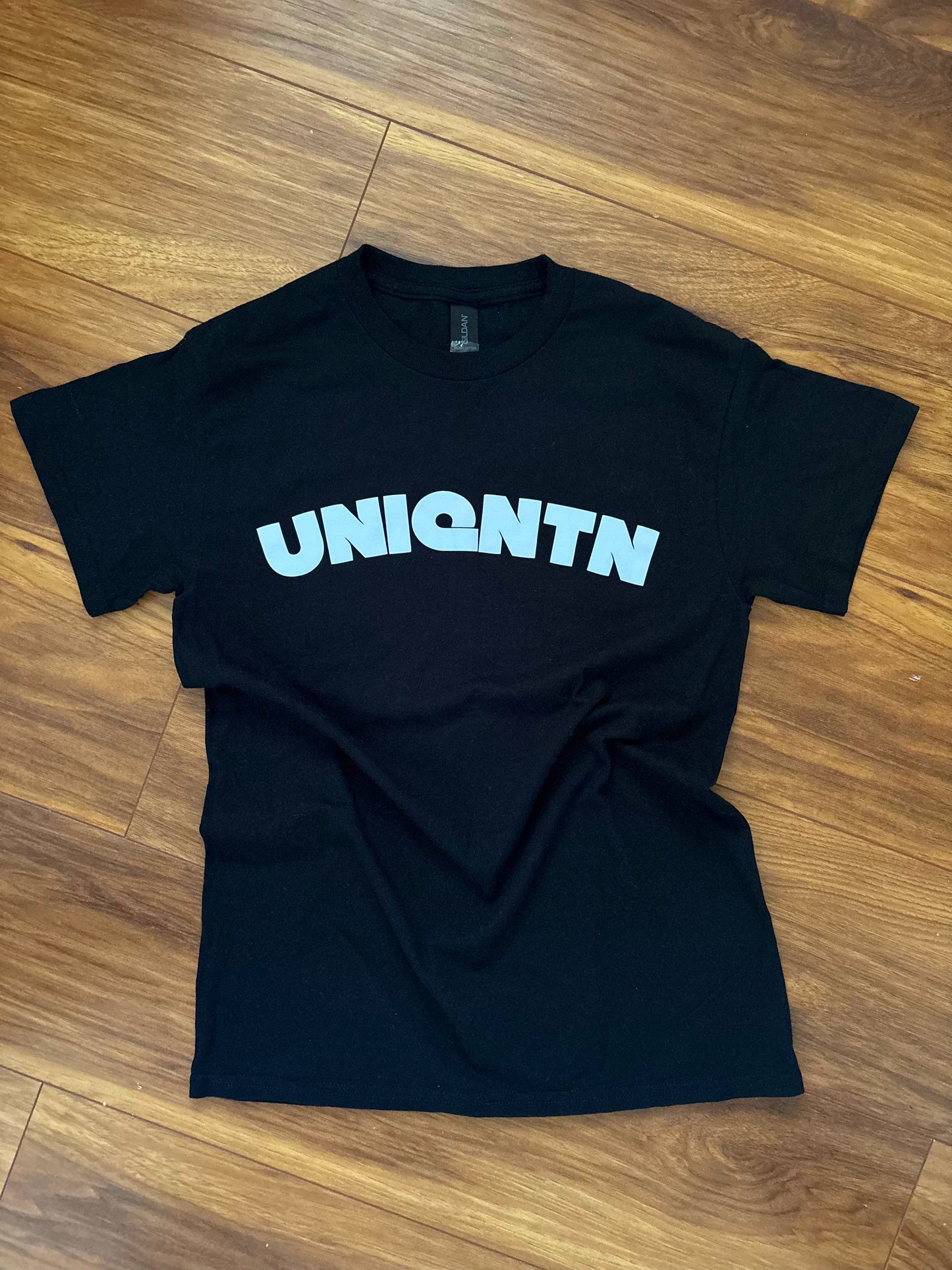 “The First Mark” black tee