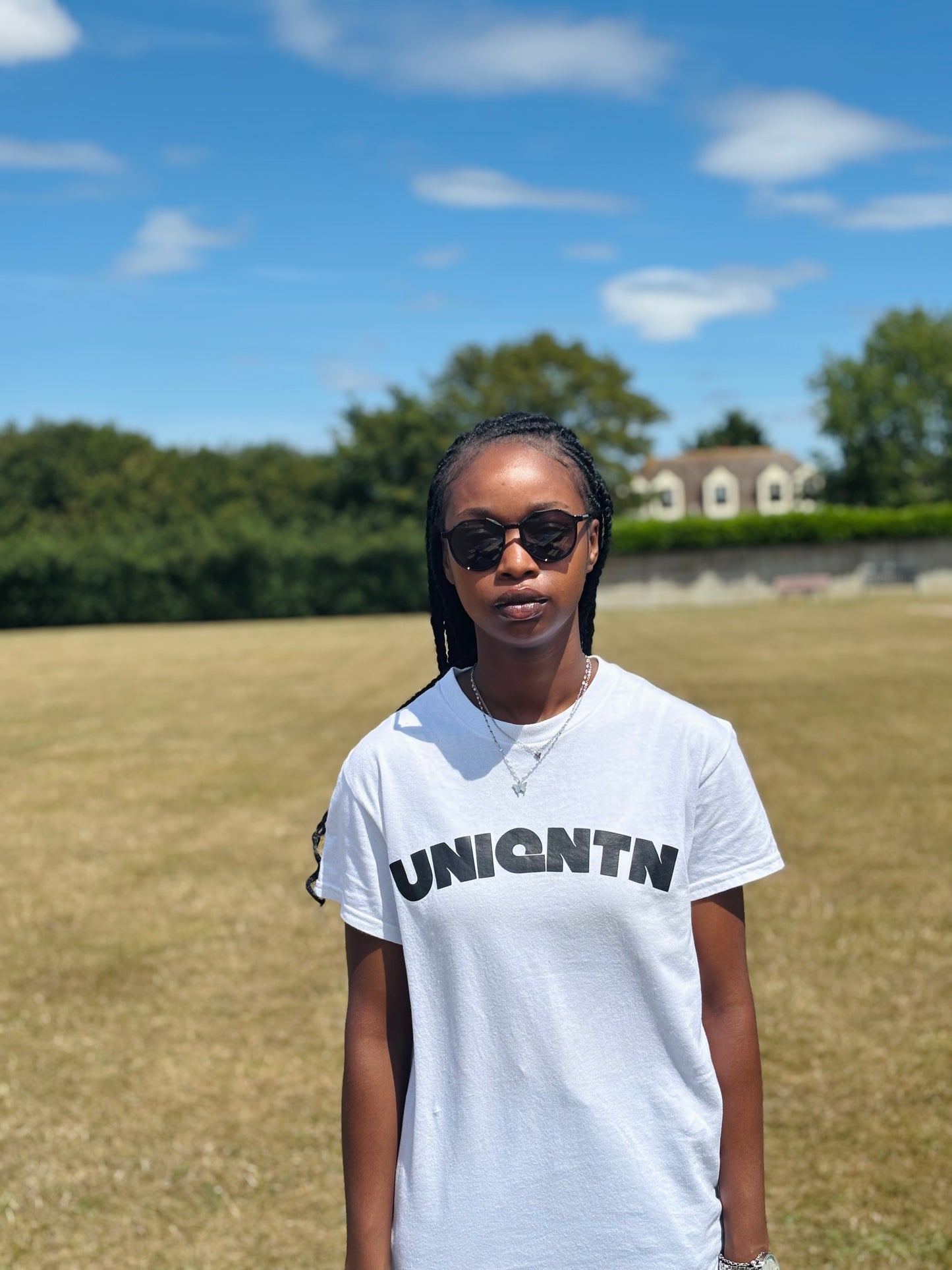 “The First Mark” white tee